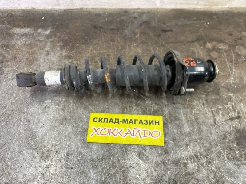 Стойка подвески Toyota Corolla Fielder NZE121G 1NZ-FE 09.2002 задняя левая (б/у)