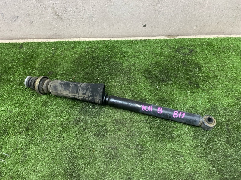 Амортизатор Nissan March K11 CG10DE 01.1992 задний (б/у)