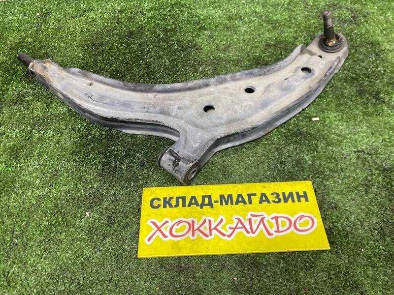 Рычаг подвески нижний Nissan March K11 CG10DE 01.1992 передний левый (б/у)