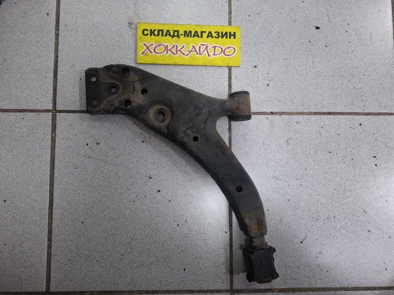 Рычаг подвески нижний Toyota Raum EXZ10 5E-FE 08.1999 передний левый (б/у)