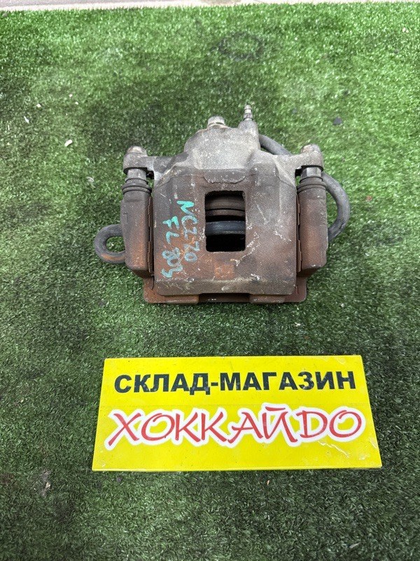 Суппорт Toyota Raum NCZ20 1NZ-FE 12.2006 передний левый (б/у)