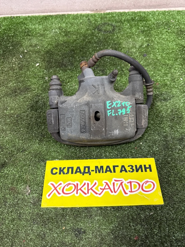 Суппорт Toyota Raum EXZ10 5E-FE 08.1999 передний левый (б/у)