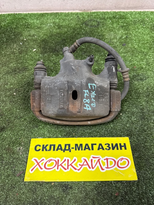 Суппорт Toyota Raum EXZ10 5E-FE 05.1997 передний левый (б/у)