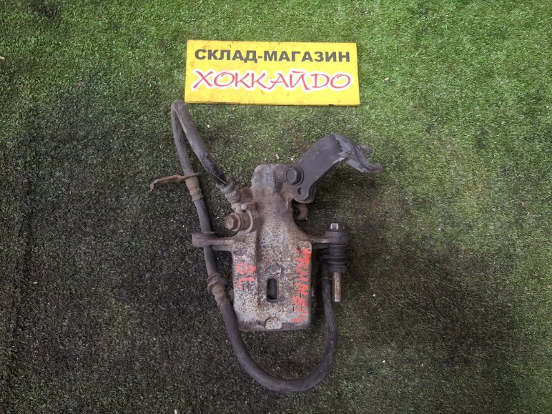 Суппорт Nissan Rasheen RHNB14 SR18DE 12.1994 задний левый (б/у)