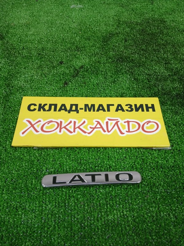 Эмблема Nissan Tiida Latio SC11 HR15DE 01.2008 задняя (б/у)