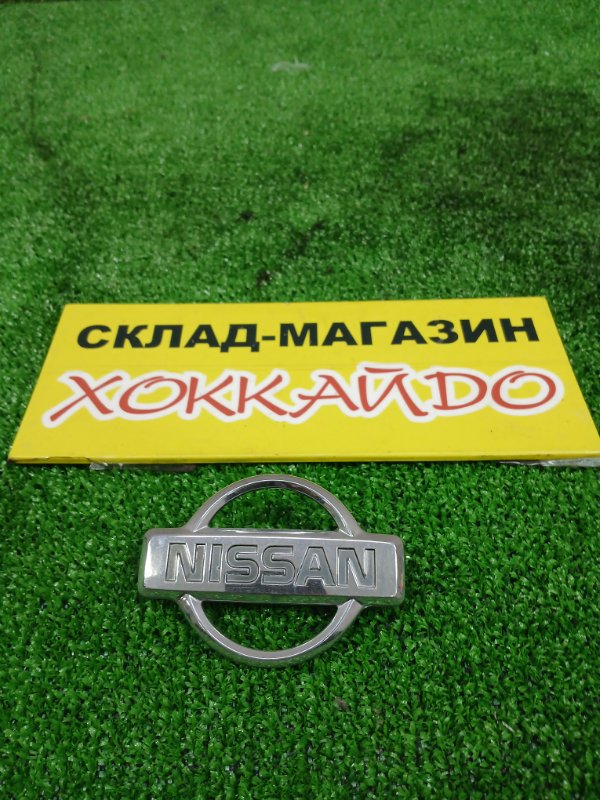 Эмблема Nissan March K11 CG10DE 01.1992 задняя (б/у)