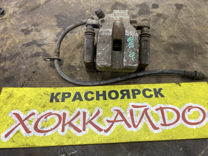 Суппорт Toyota Camry ACV40 2AZ-FE 01.2006 задний левый (б/у)