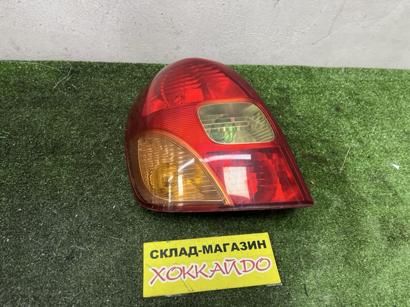 Фонарь стоп-сигнала Toyota Corolla Spacio NZE121N 1NZ-FE 05.2001 задний левый (б/у)