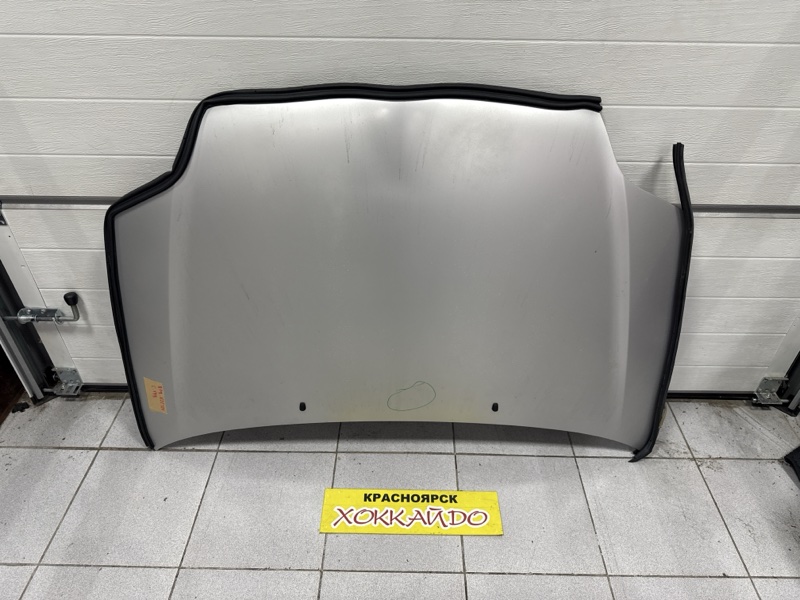 Капот Toyota Corolla Fielder NZE121G 1NZ-FE 08.2000 (б/у)