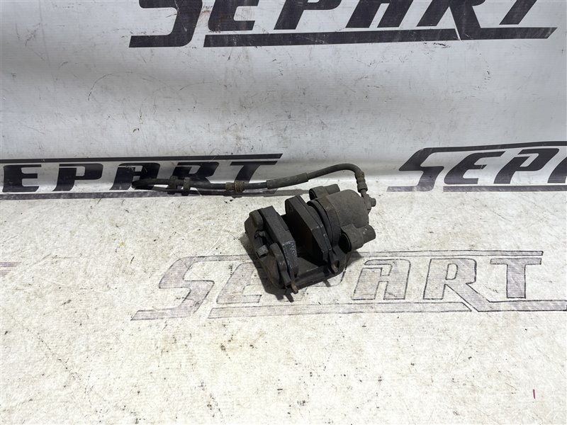 Суппорт тормозной передний левый Skoda Rapid 1.4 CUSB