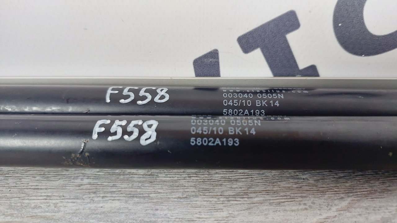 Амортизатор крышки багажника Mitsubishi Colt Z30 Z34A