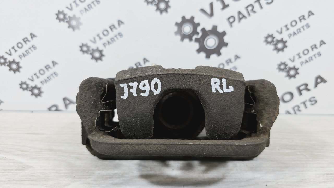 Суппорт тормозной задний левый Nissan Juke YF15 HRA2DDT