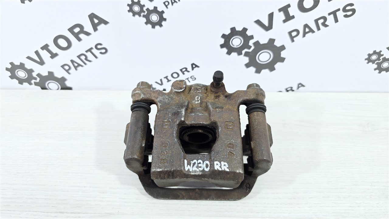 Суппорт тормозной пробег 30к задний правый Nissan Qashqai J10 HR16DE