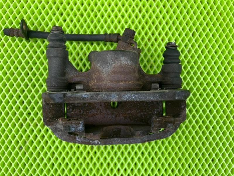 Суппорт передний левый CYNOS 1996-1999 EL52 4E-FE Суппорт передний левый CYNOS 1996-1999 EL52 4E-FE