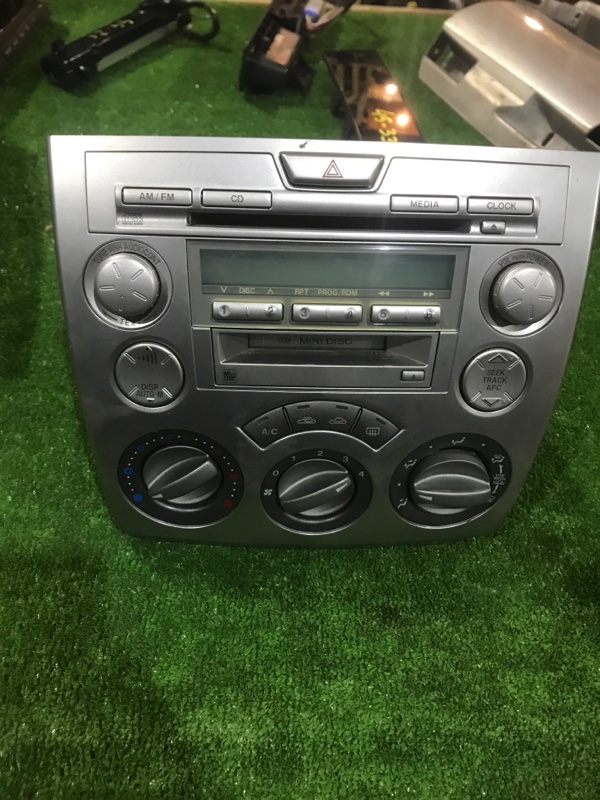 Штатная магнитола mazda demio 2003. Магнитола мазда демио dw3w. Магнитола mitsubishi tv-w70d. Консоль магнитолы мазда демио 2004. Климат контроль mazda demio dy3w dy5.