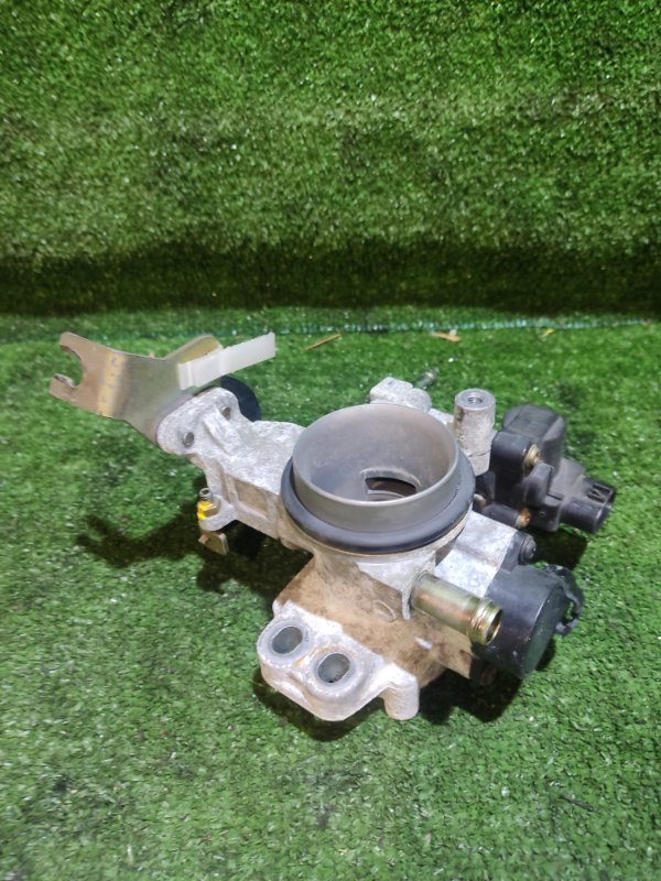 Заслонка дроссельная Toyota Vitz SCP10 1SZ-FE 2004 (б/у) Заслонка дроссельная Toyota Vitz SCP10 1SZ-FE 2004 (б/у)