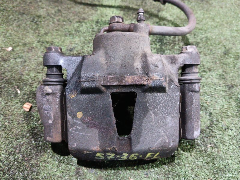 Суппорт Toyota Vitz SCP10 1SZ-FE 2004 передний левый (б/у)