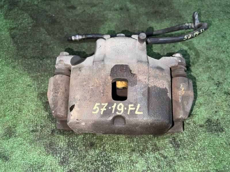 Суппорт Mitsubishi Grandis NA4W 4G69 2008 передний левый (б/у)