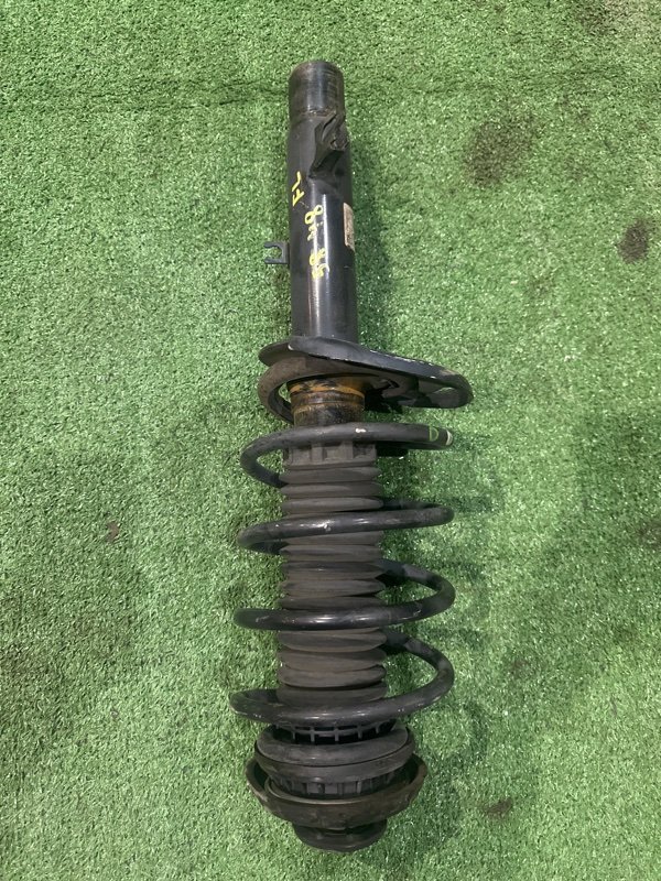 Стойка подвески Peugeot 208 A9 EB2F 2014 передняя левая (б/у)