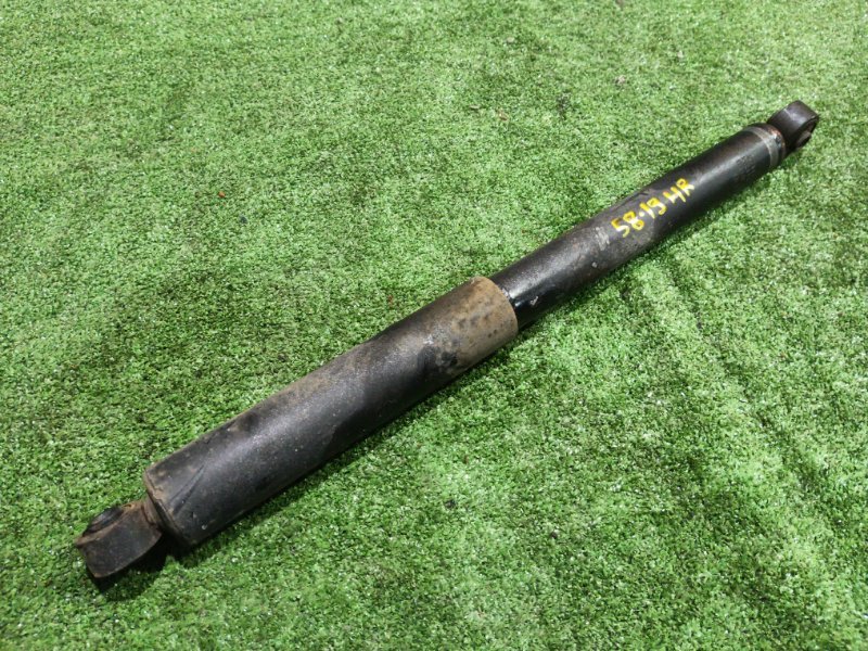 Амортизатор Daihatsu Boon M310S 1KR-FE 2007 задний правый (б/у)