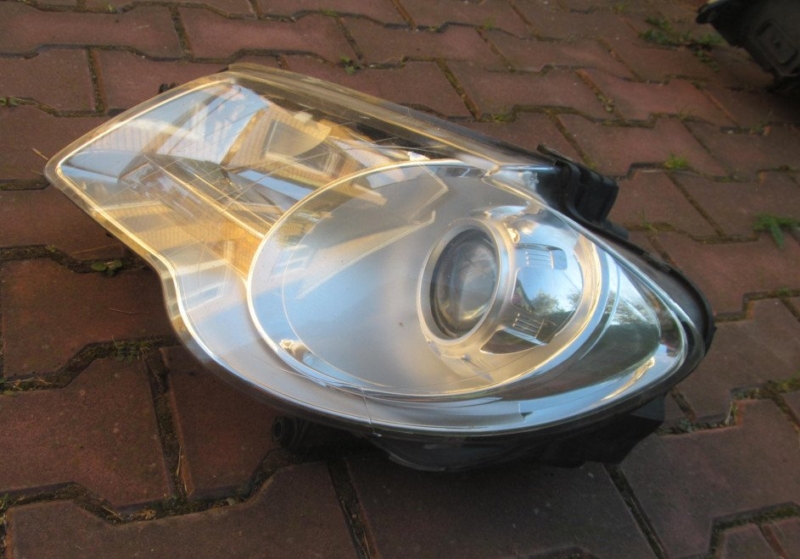 Фара левая Volkswagen Touran 2003-2015