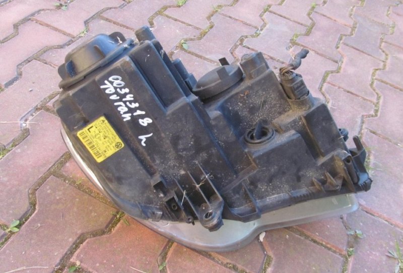 Фара левая Touran 2003-2015