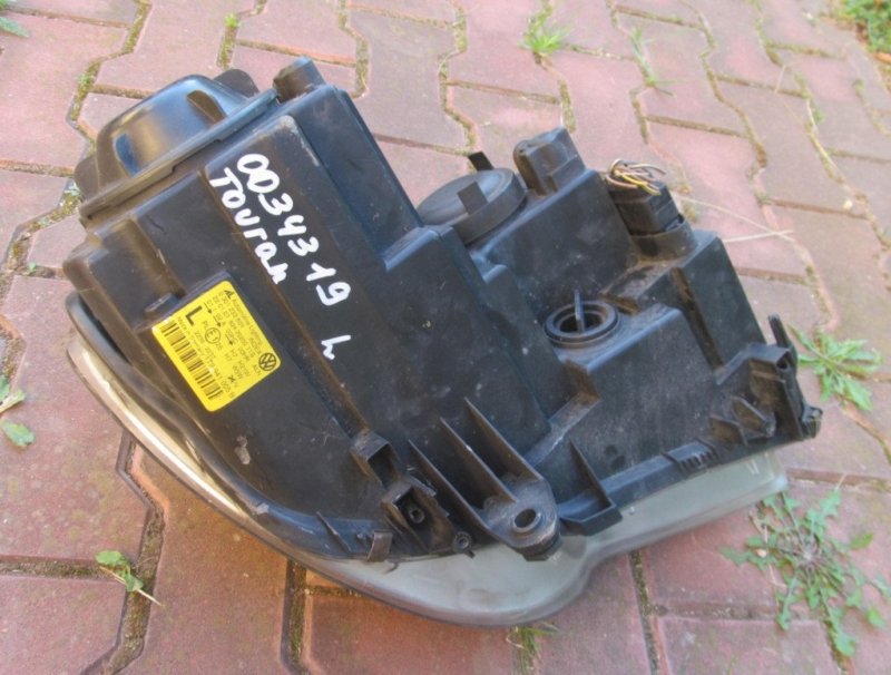 Фара левая Touran 2003-2015 Фара левая Touran 2003-2015