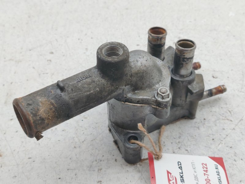 Корпус термостата Toyota Corolla AE100 4AFE