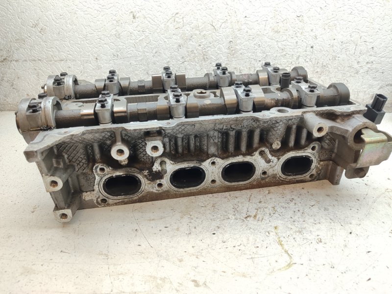 Головка блока цилиндров Mazda Familia BJ3P FPDE (б/у) Головка блока цилиндров Mazda Familia BJ3P FPDE (б/у)