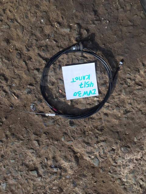 Запчасть тросик капота Toyota Prius ZVW30 контрактная Тросик капота Toyota Prius ZVW30 контрактная