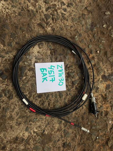 Запчасть тросик лючка бензобака Toyota Prius ZVW30 контрактная Тросик лючка бензобака Toyota Prius ZVW30 контрактная