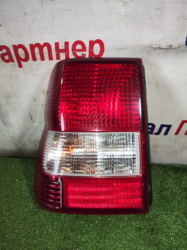 Стоп Mitsubishi Pajero Io H77W 4G94 2006 левый 1311