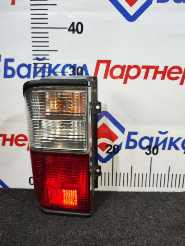 Стоп NISSAN VANETTE SK82MN F8 задний левый 220-61471 (б/у)
