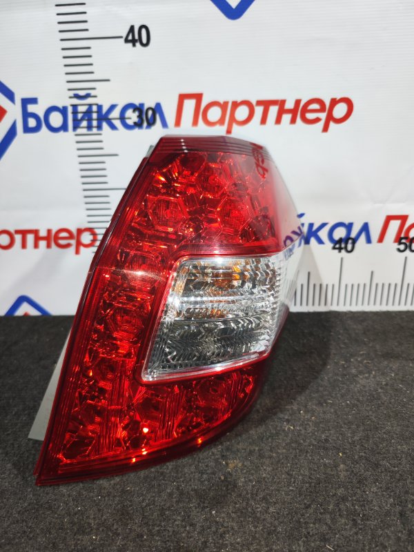 Стоп HONDA FIT SHUTTLE GG7 L15A 2011 задний правый W0020 (б/у)