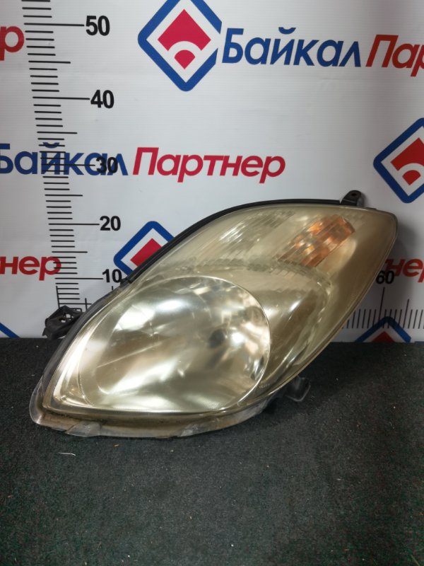 Фара TOYOTA VITZ NCP95 2NZ-FE 2007 передняя левая 52-184 (б/у)