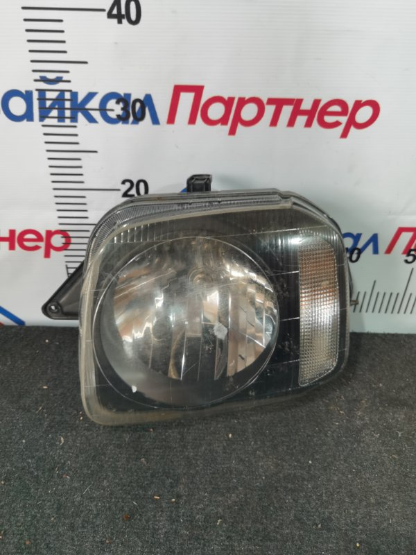 Фара SUZUKI JIMNY JB23W K6A 2014 передняя левая 100-32647 (б/у)