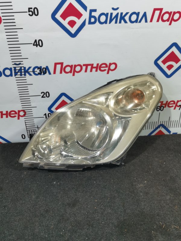 Фара SUZUKI SPLASH XB32S K12B передняя левая (б/у)