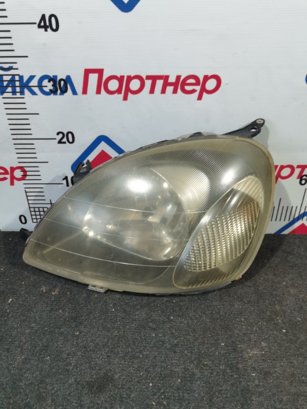 Фара TOYOTA VITZ NCP10 2NZ-FE 2002 передняя левая 52-001 (б/у)
