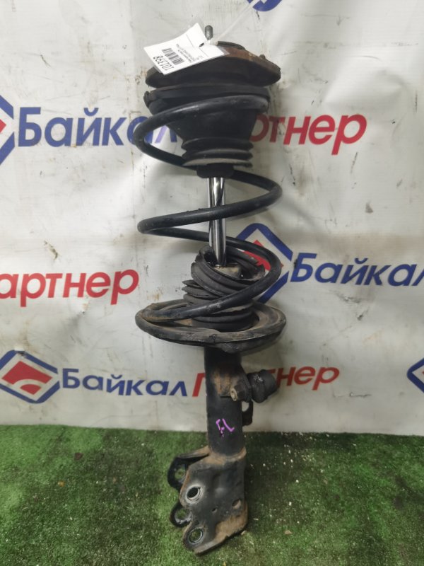 Стойка подвески TOYOTA PRIUS NHW20 1NZ-FXE 2004 передняя левая (б/у)