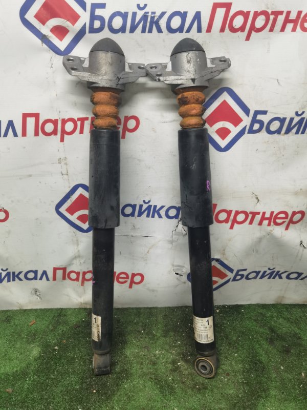 Амортизатор VOLKSWAGEN PASSAT 3CCAX CAXA 2012 задний (б/у)