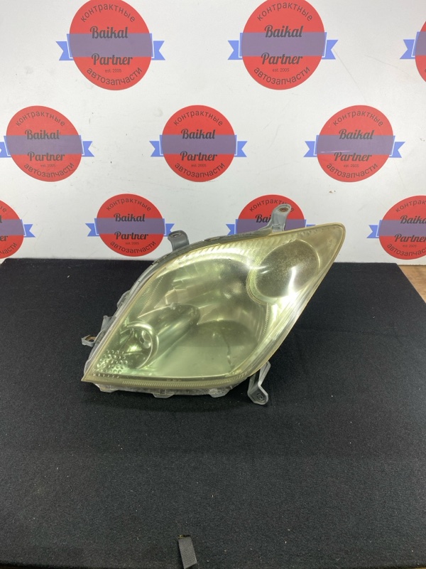 Фара TOYOTA IST NCP61 1NZ-FE 2002 передняя левая 52-064 (б/у)