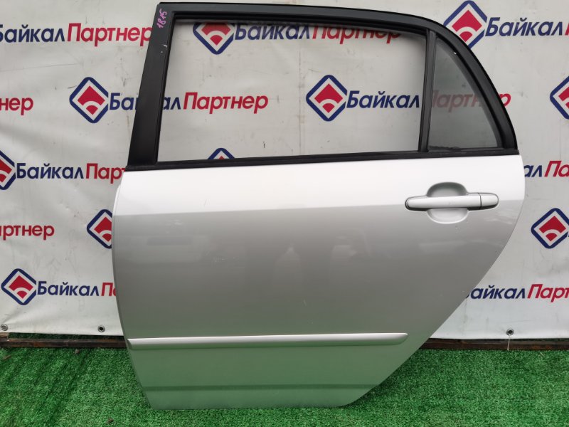 Дверь TOYOTA COROLLA RUNX NZE121 1NZ-FE 2002 задняя левая (б/у)