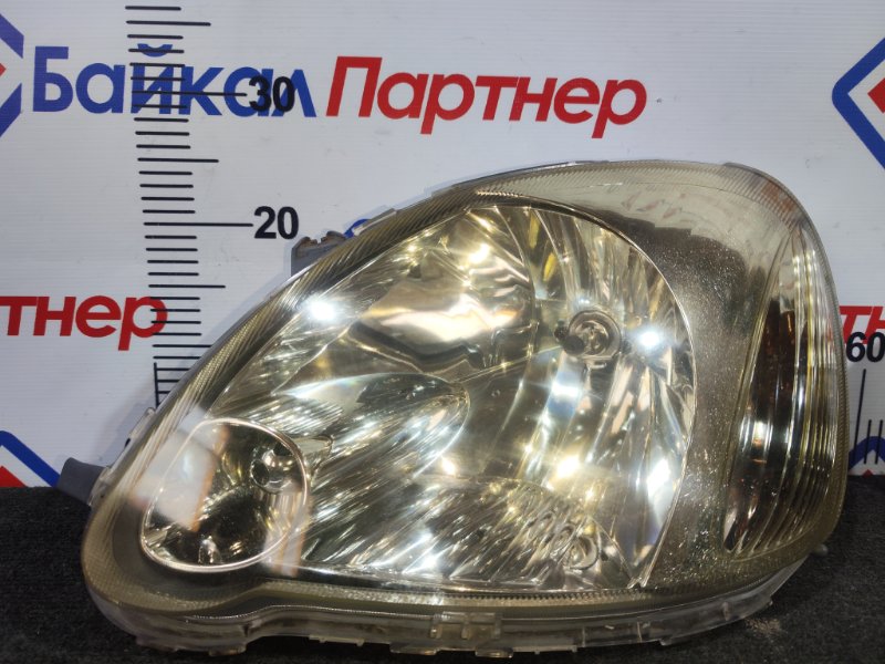 Фара TOYOTA VITZ NCP15 2NZ-FE 2004 передняя левая (б/у)