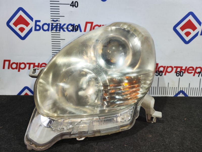 Фара TOYOTA PASSO KGC30 1KR-FE передняя левая 100-51007 (б/у)