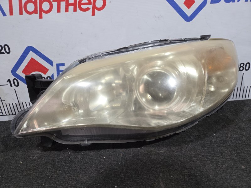 Фара SUBARU IMPREZA GH2 EJ15 2011 передняя левая 18-09 (б/у) Фара SUBARU IMPREZA GH2 EJ15 2011 передняя левая 18-09 (б/у)