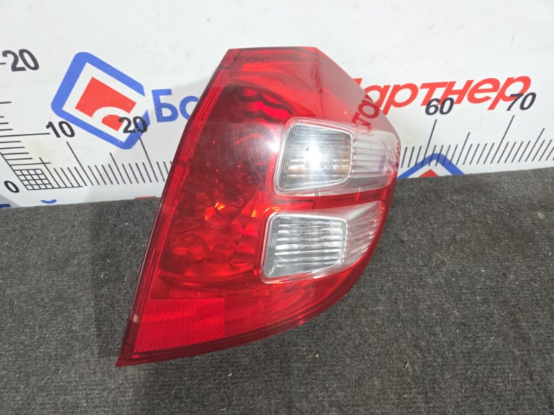 Стоп HONDA FIT GE6 L13A задний правый 70-30 (б/у) Стоп HONDA FIT GE6 L13A задний правый 70-30 (б/у)