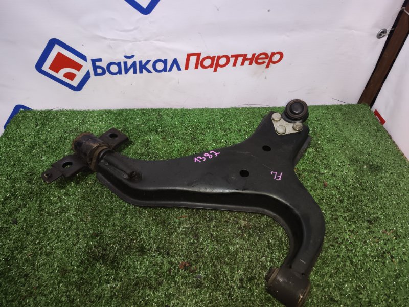 Рычаг подвески нижний NISSAN ELGRAND ALE50 VG33E 1999 передний левый (б/у)