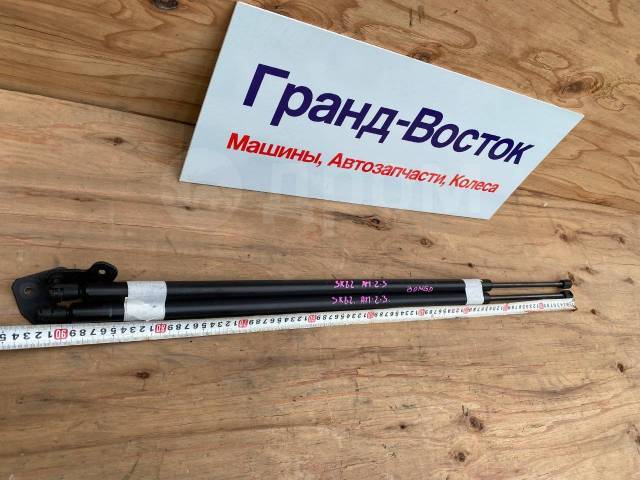 Амортизатор двери задний Bongo SK82