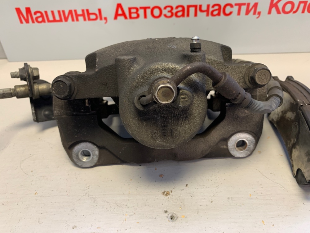 Суппорт передний правый Mazda Atenza GHEFP