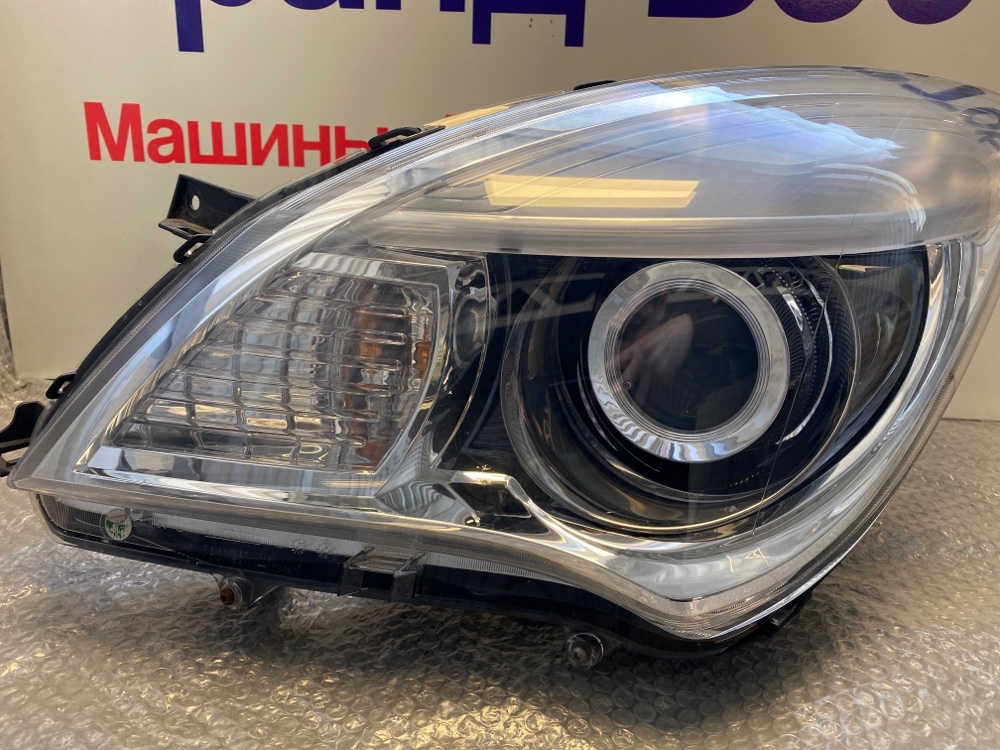 Фара левая Mitsubishi Delica D2 Mb15s